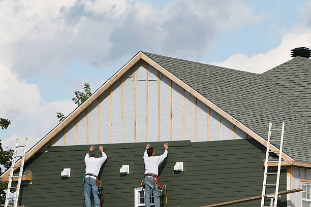 Professional Siding technician working in East Rochester, OH